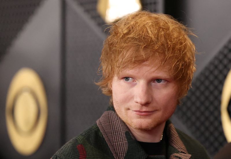 Police in India pull the plug on British singer Ed Sheeran's impromptu street concert