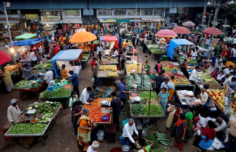 India's wholesale inflation rises slightly in February