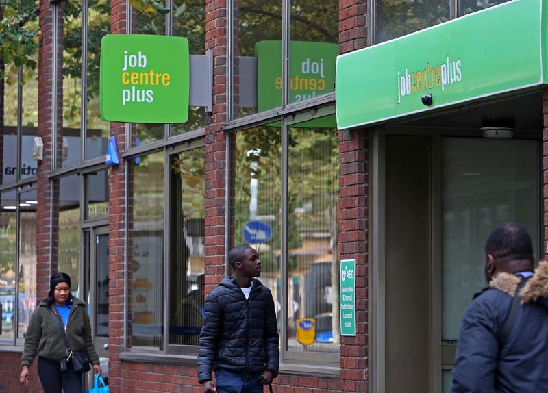 UK wage growth little changed, official statistics show