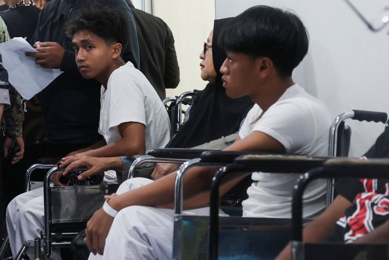 Blasts injure dozens at Indonesian mosque, student suspected