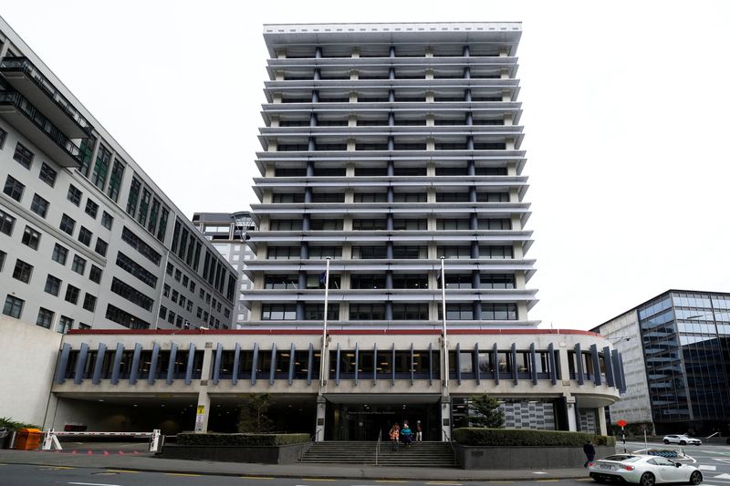 NZ central bank cuts rates to over 3-year low, signals end to easing cycle