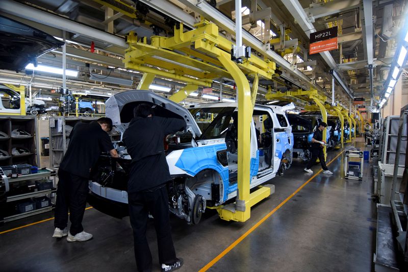 China's November factory activity swings back to decline, private PMI shows
