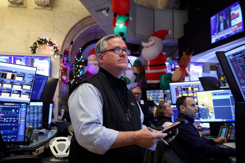 S&P 500 ends slightly down as investors await Fed rate decision