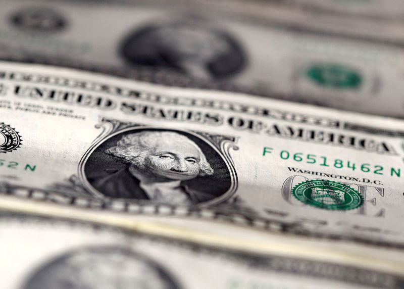 US dollar slides after Fed cuts rates, as expected