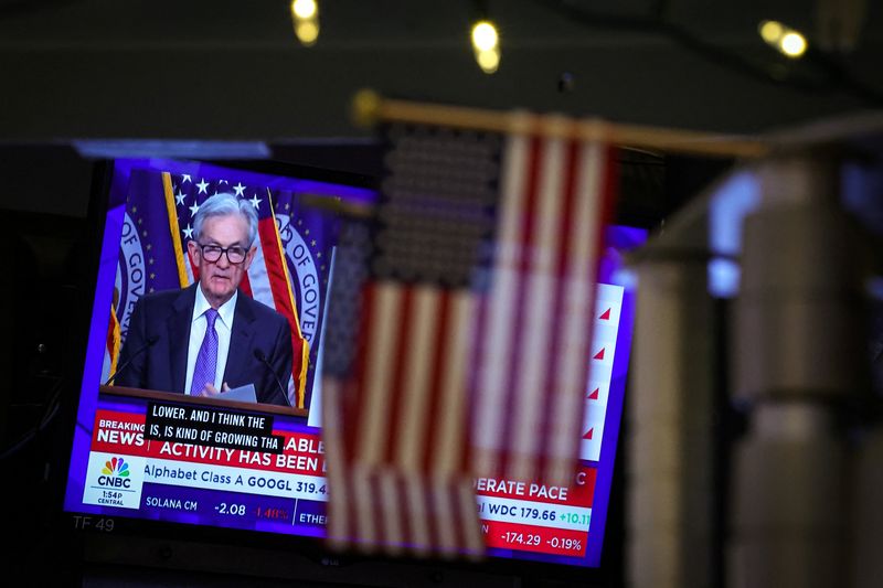 Analysis-Fed signals pause on rate cuts as investors navigate data darkness and leadership change