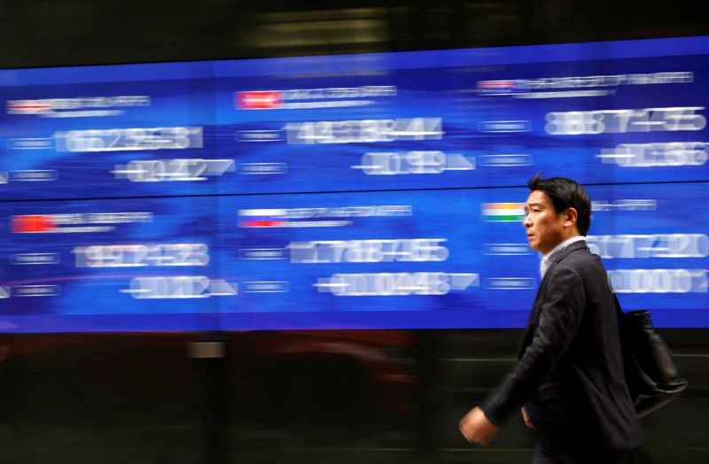 Asian stocks cautiously higher as tech sector rattled by Oracle