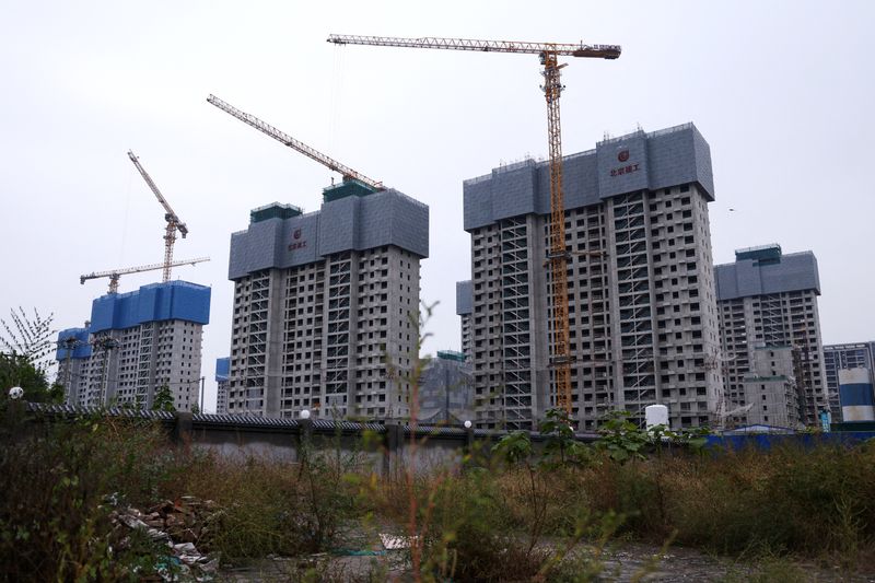 China's home prices slide further in November