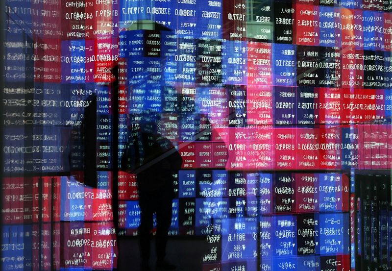 Asia stocks join Wall St rally, brace for BOJ hike