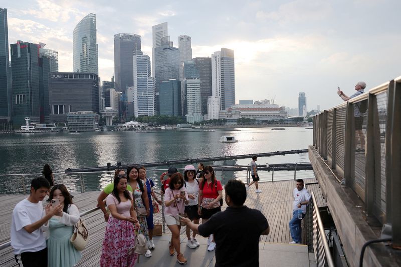 Analysis-As global scrutiny grows, Chinese firms look to call Singapore home