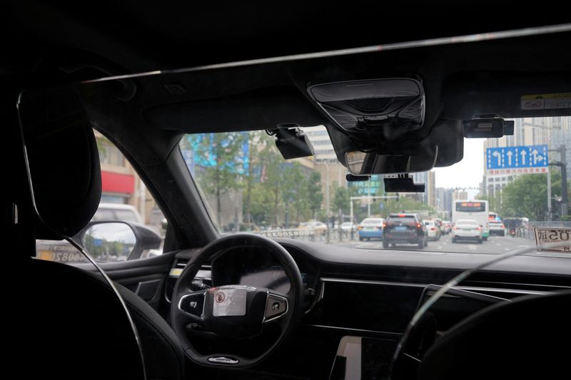Factbox-Driverless future gains momentum with global robotaxi deployments