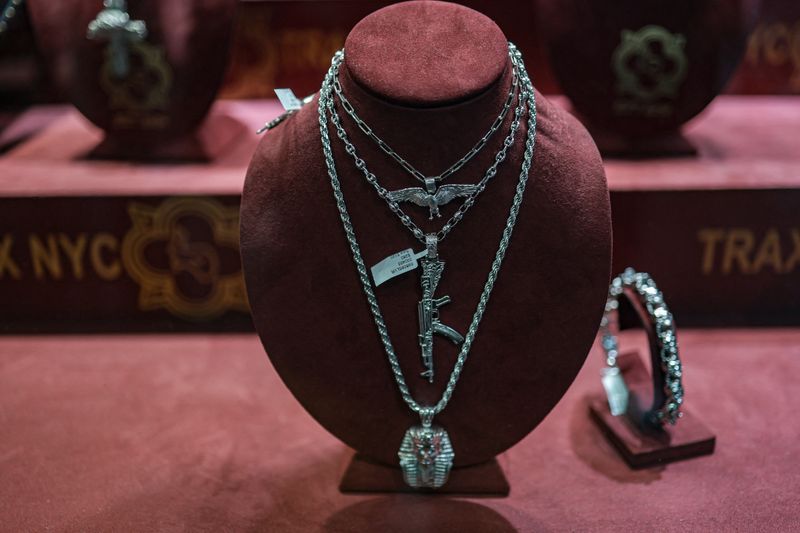 Silver tops $75 as gold and platinum surge to records