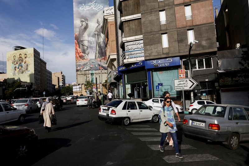 Iran propaganda push seeks to project unity despite internal divisions