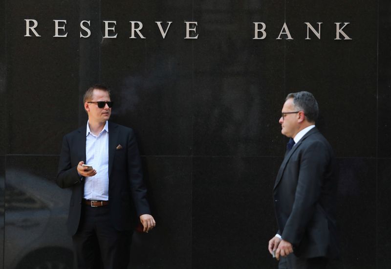 Australia's central bank cut rates, cautious on further easing