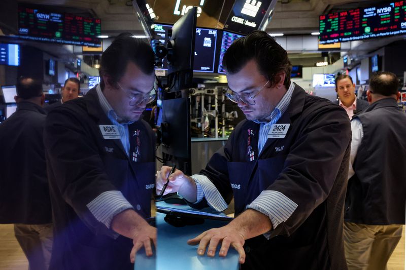 Futures flat after Thursday's fall as markets await Fed, tariff cues 