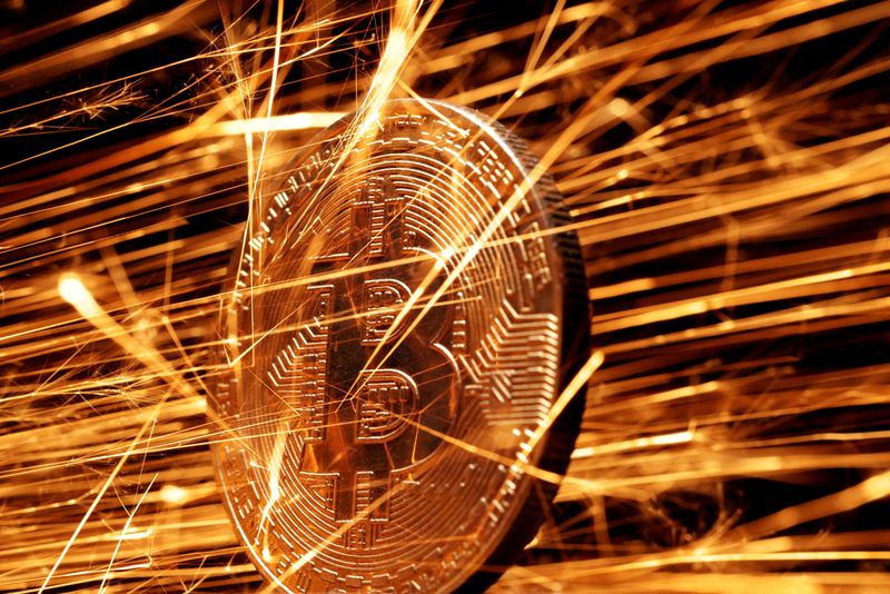 Bitcoin slides more than 5% to lowest level since November 11