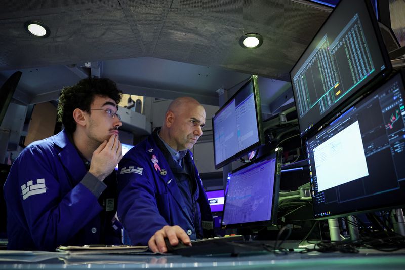 Futures fall as tariff uncertainty prevails; chipmakers slide