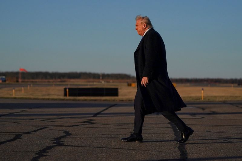 Trump signs memo aimed at preventing abuse of legal system, federal courts