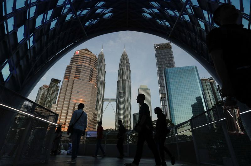 Malaysia must focus on reforms even as trade risks rise, central bank says 