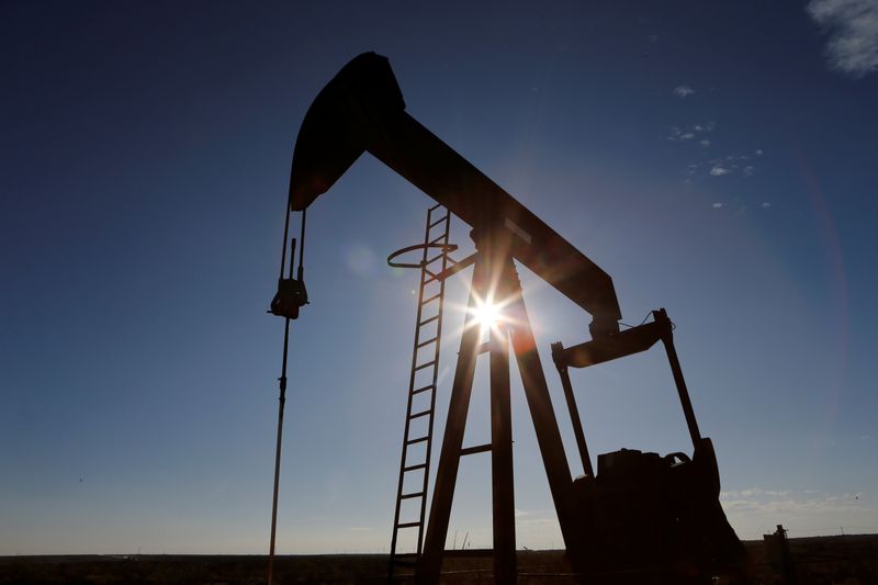 Oil prices little changed as investors weigh impact of Trump tariffs