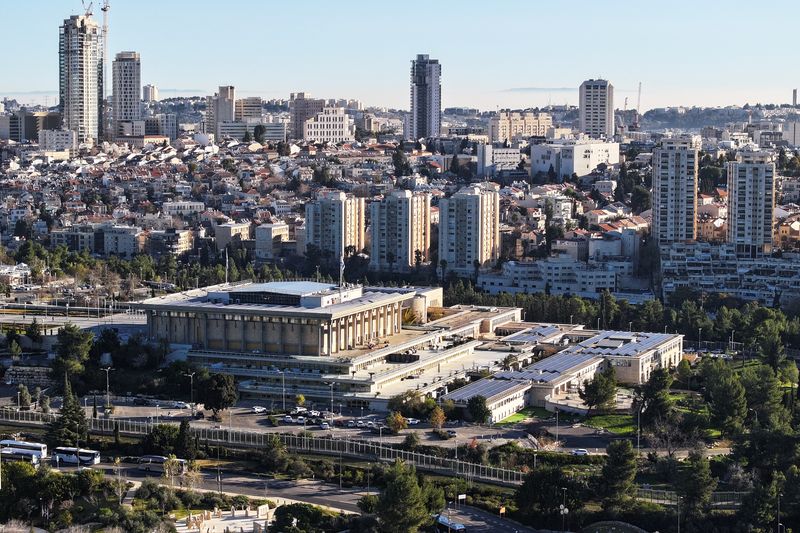 Israel parliament approves budget as hostage families protest in chamber