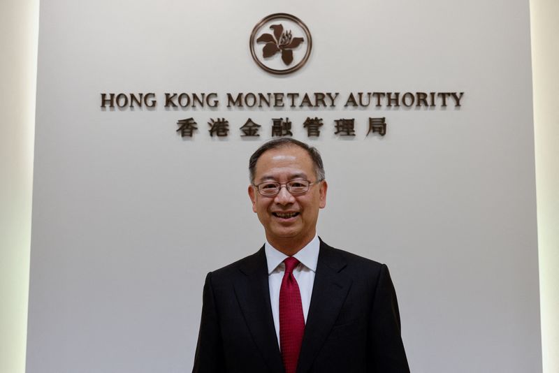 Hong Kong to benefit more from capital flows out of China, central bank chief says