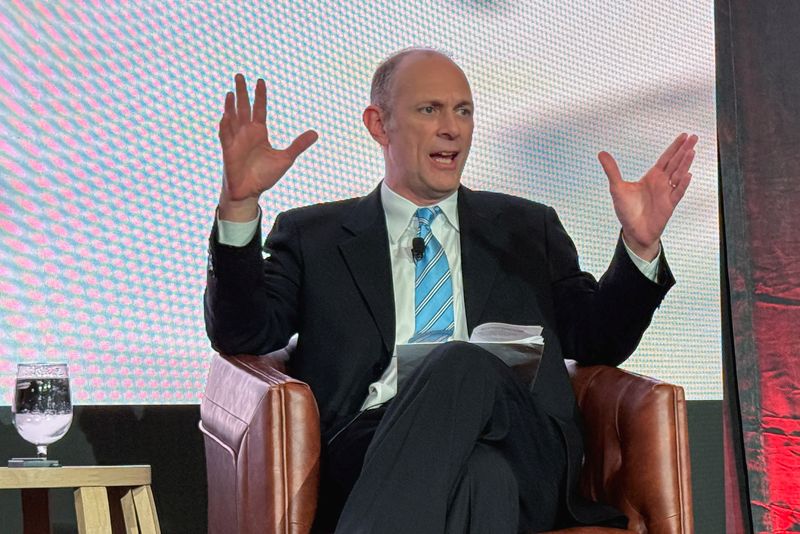 Fed's Goolsbee sees lower interest rates in a year's time, but warns of uncertainties, FT reports
