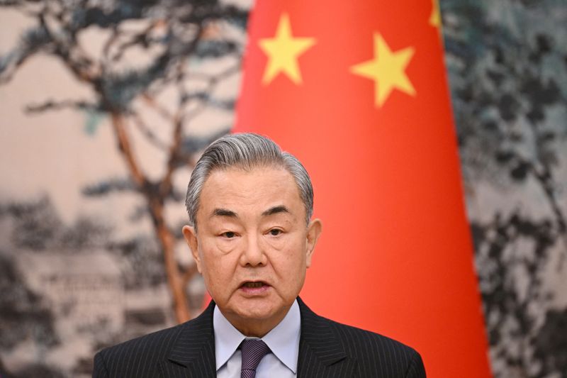 Russian and US steps to normalise ties bring optimism, China's foreign minister says