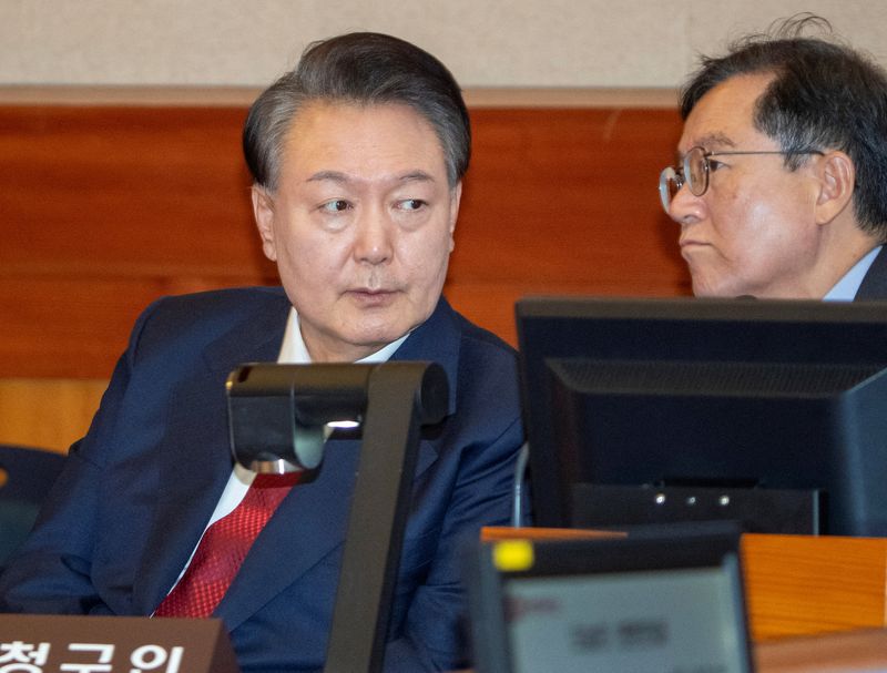 South Korea's acting president urges calm, tighter security ahead of impeachment ruling