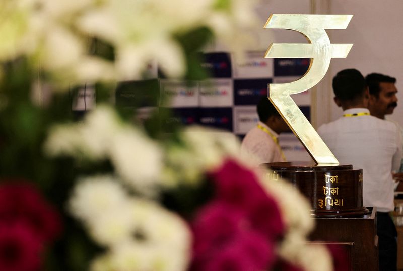 Indian rupee to react to US tariffs, bond yields seen inching lower