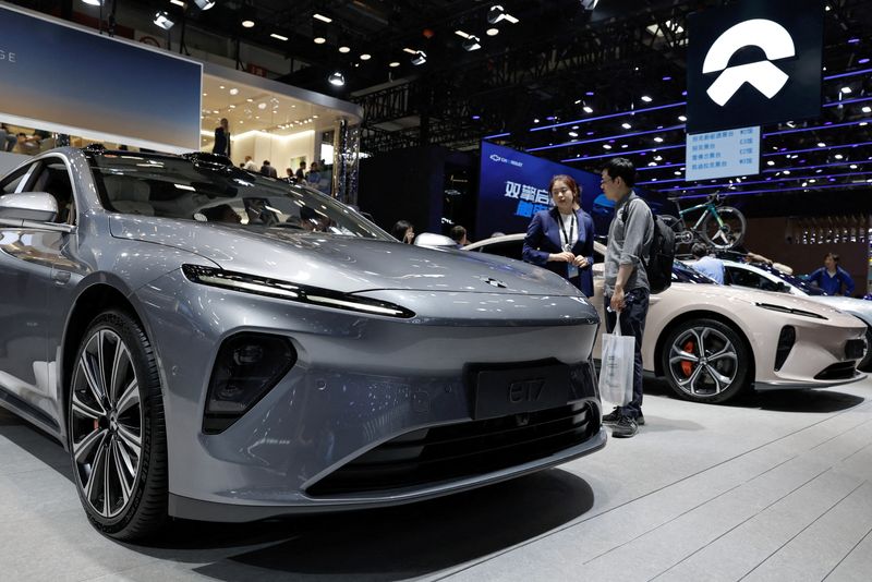 China's main auto show cast in unwelcome spotlight as government backers clash