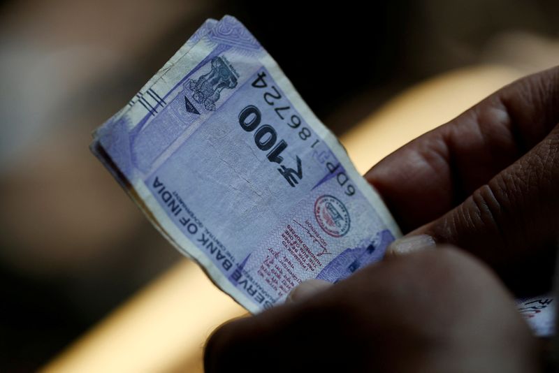 Rupee to weaken on risk aversion, Asia FX fall stoked by US tariffs