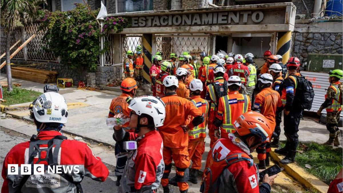 Rescuers inch closer to quake survivor after eight days - and he's cheering them on