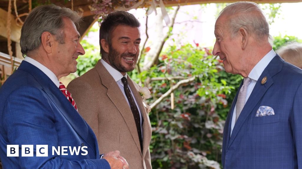 King all smiles as he meets David Beckham at Chelsea Flower Show
