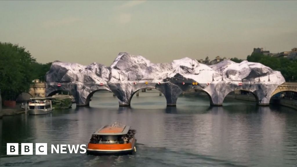 Timelapse footage shows 'giant cave' inflating on Paris bridge