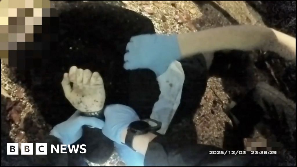 Police bodycam shows officers handcuffing stabbed student as he lay dying
