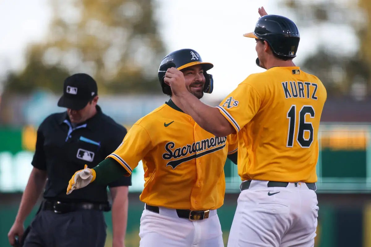 Athletics hit 3 homers to beat Yankees 6-4 and snap a 4-game losing streak