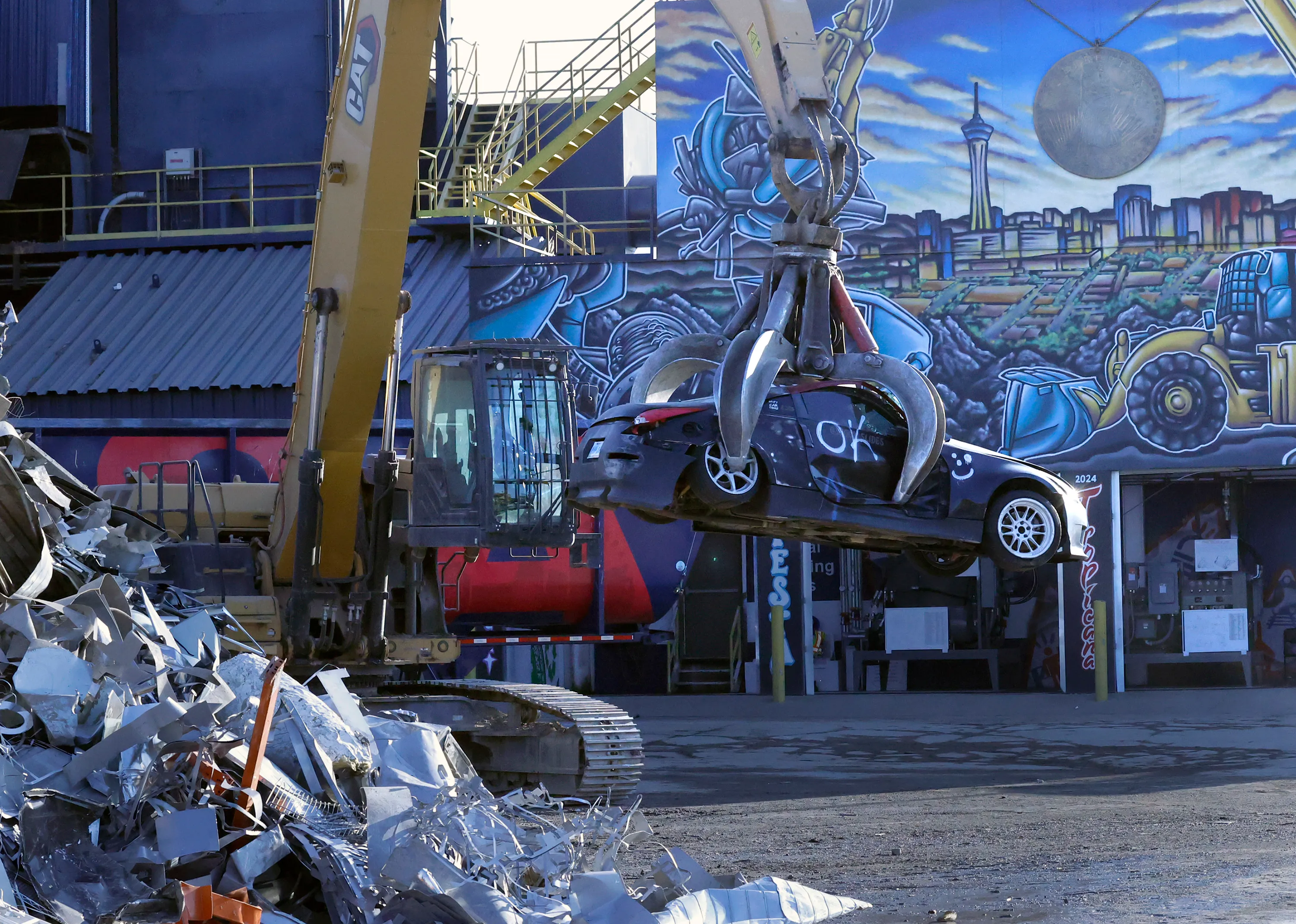 Metro crushes street takeover cars in massive shredder