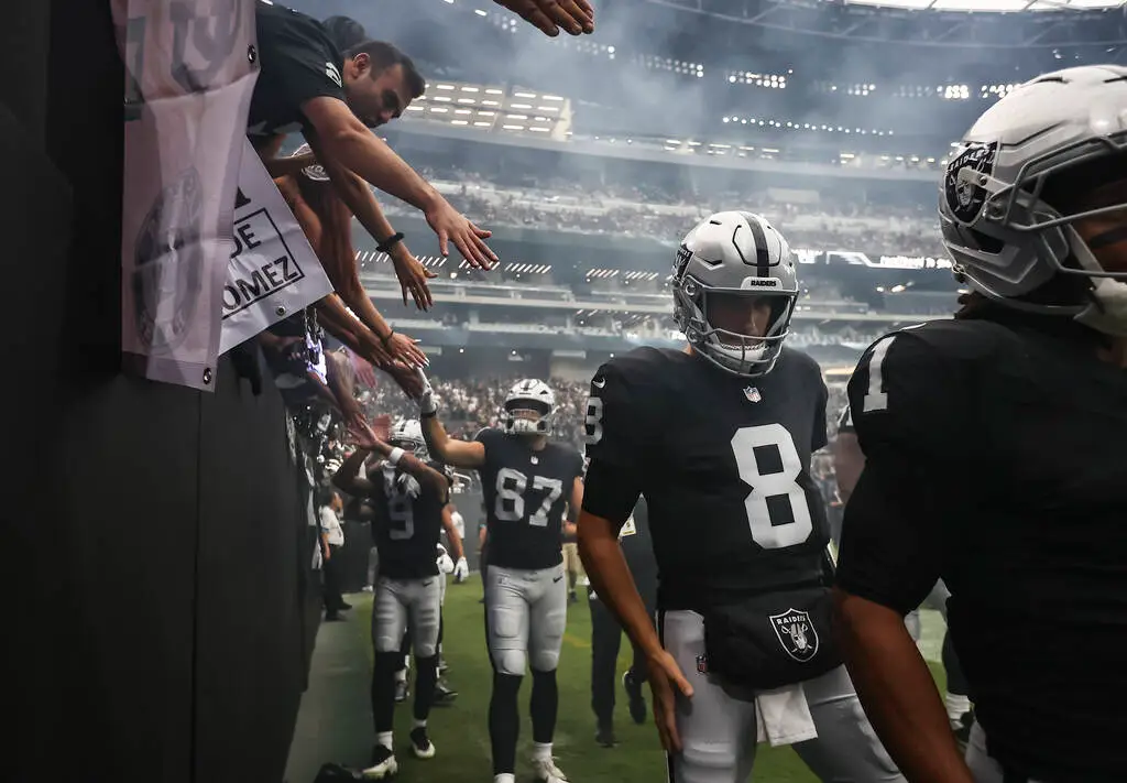How has Raiders quarterback Kirk Cousins fared in his Week 1 starts?