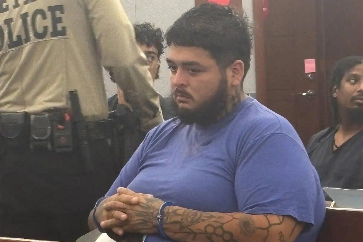 Las Vegas man charged in triple slaying appears in court