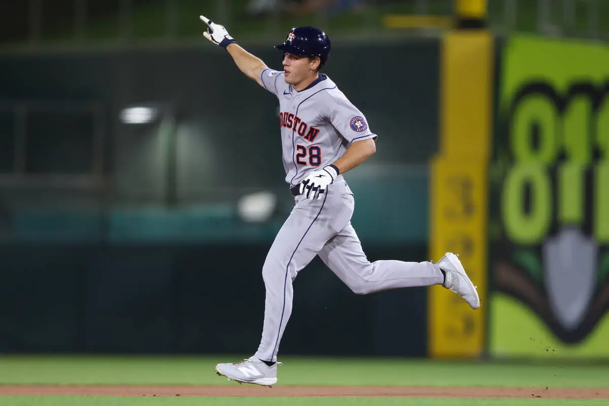 Spence helps Astros survive Athletics 7-5 to keep playoff hopes alive